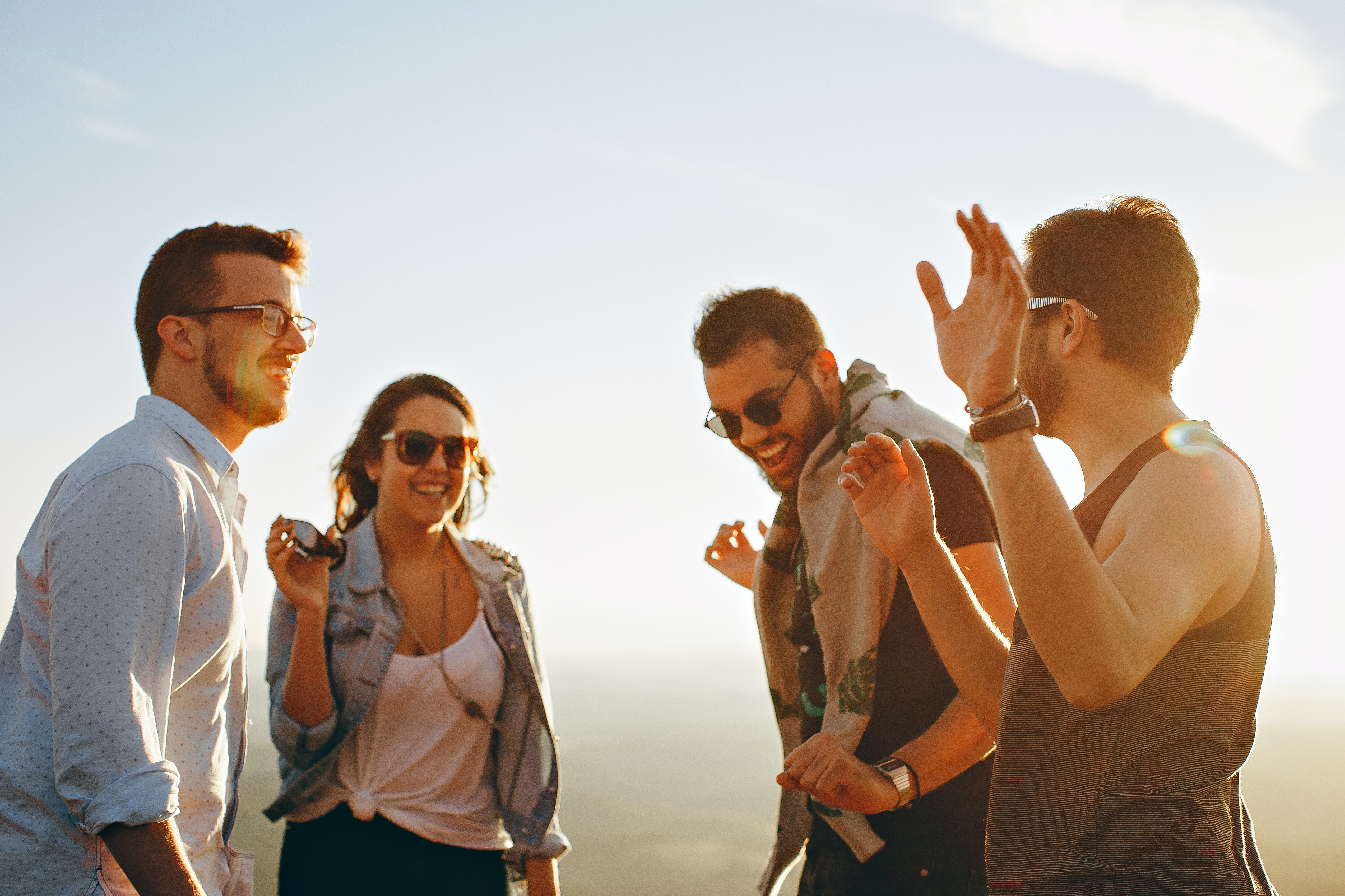 group-of-people-having-fun-together-under-the-sun-708392
